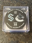 Vancouver Canucks Vs Seattle Kraken Used Warm-up Puck 3/14/2026 With Case + Coa. Fixed Price $599.00.